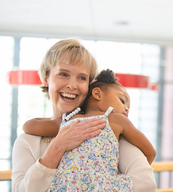 Woman and her child smiling